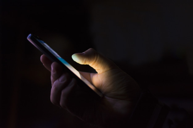 Smart phone in a dark